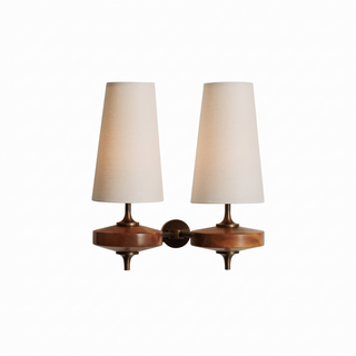 Nikau walnut and antique brass wall sconce on white