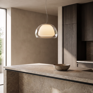 Bolla pendant lit over a stone kitchen island