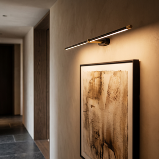 Lumen Bar mounted above artwork in a hallway