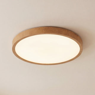 Niva Wood-finish flush ceiling light, close installed view with light on